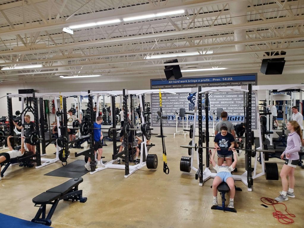 Students workout in the Unity Christian weight room.