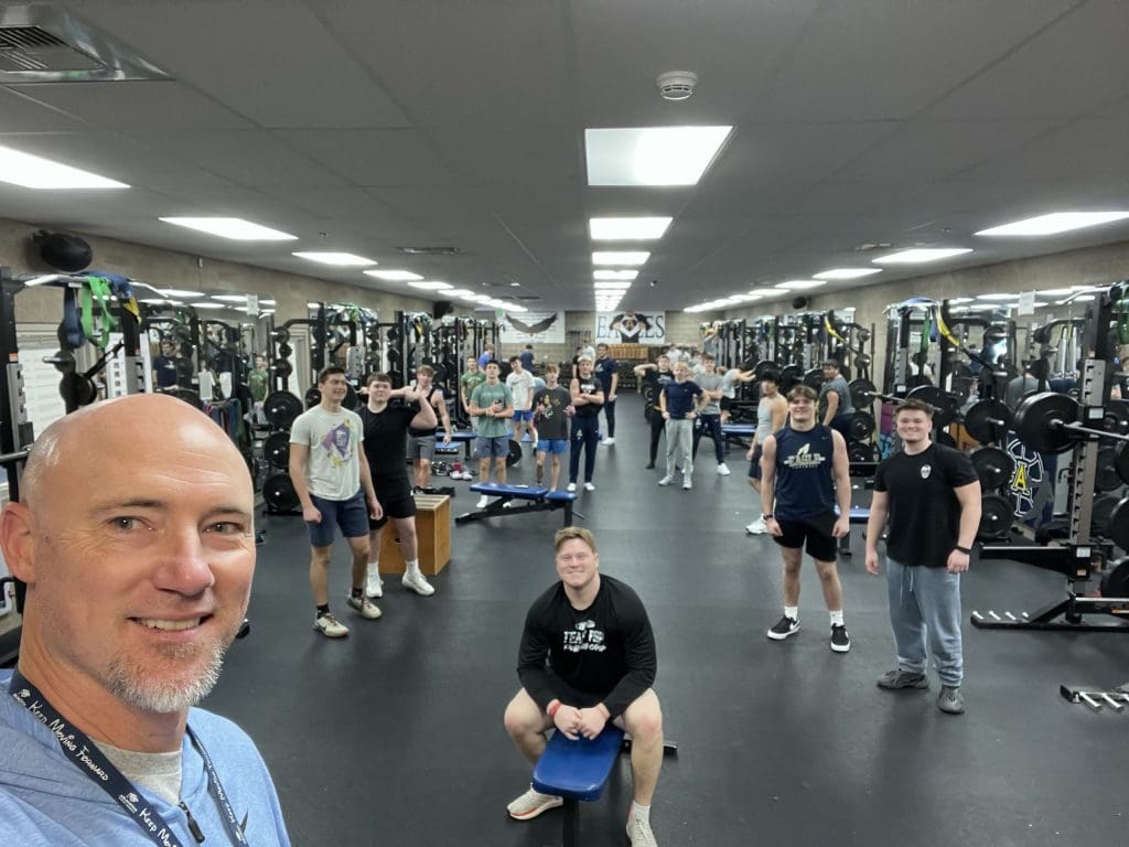 Selfie of PE teacher Judd Hunter with class of physical education students.