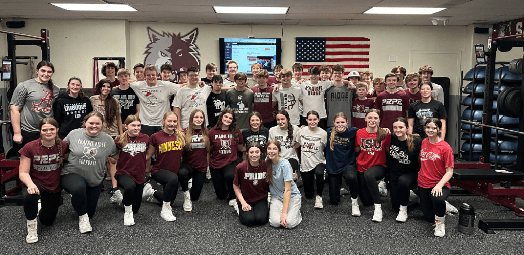 Group of students inside the Prairie Ridge High School weight room.