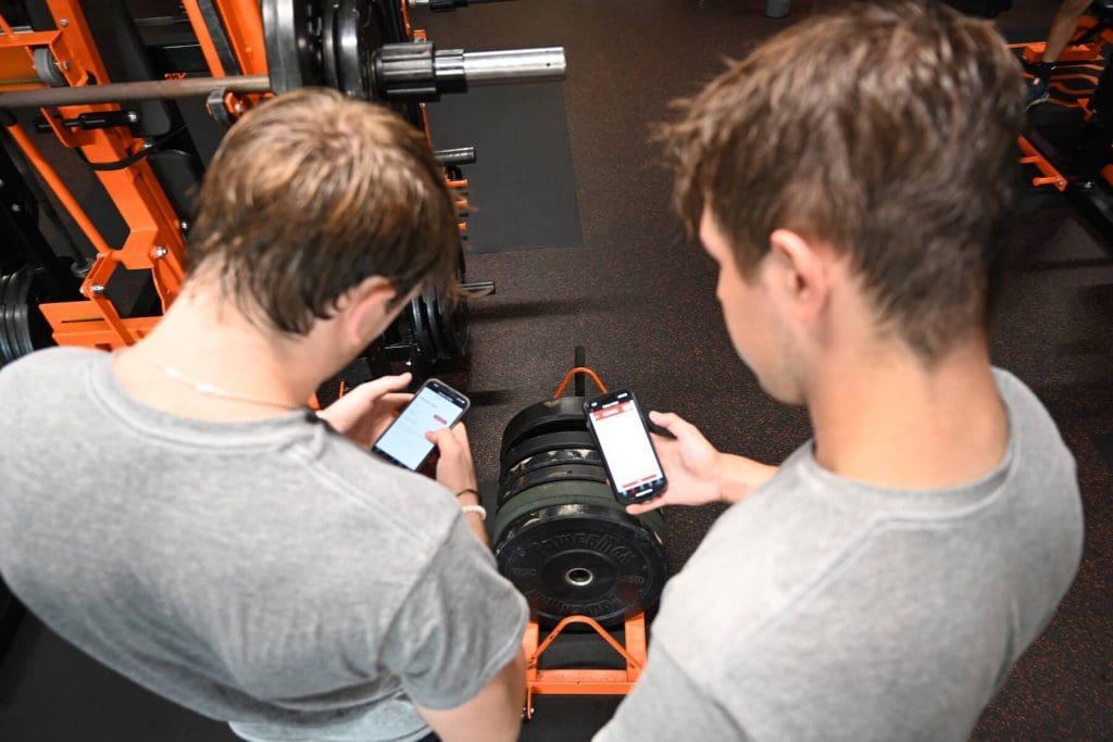 Athletes check their personalized weights using the PLT4M app.