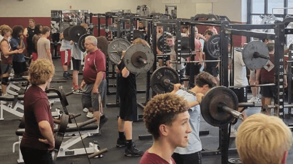 Robinson athletes workout in the weight room.