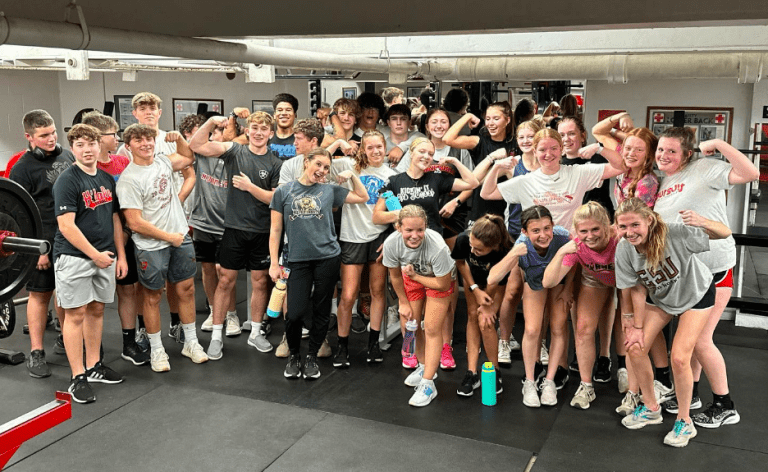 Honesdale athletes in the weight room posing for a picture.
