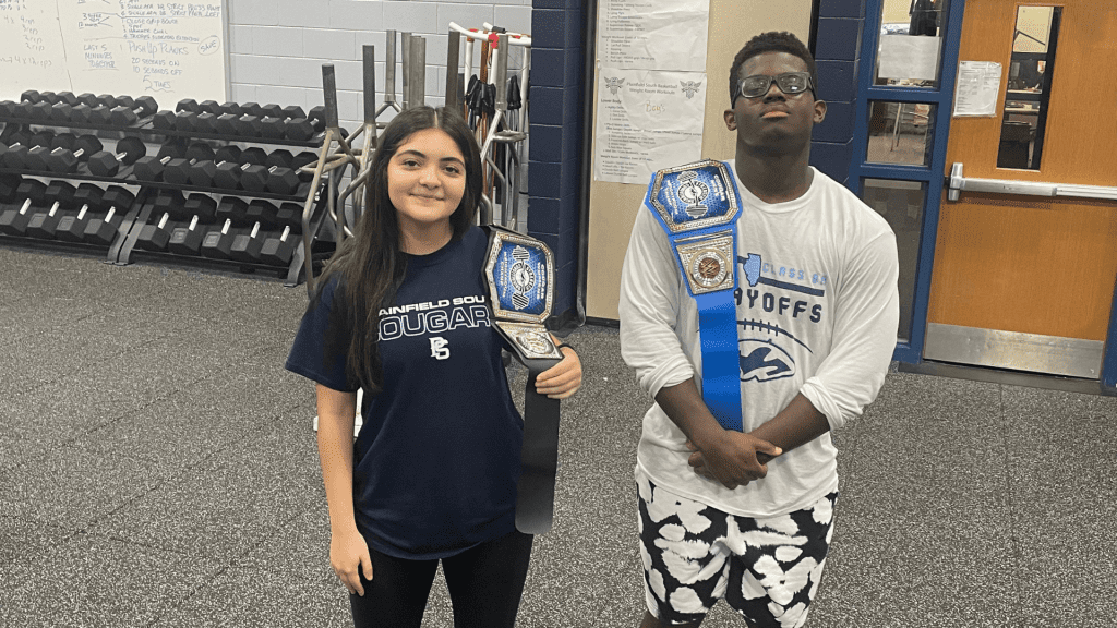Plainfield South students with the weightroom champ award.