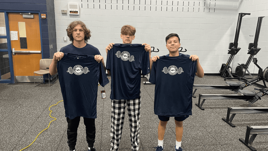 Plainfield South students show their new strength and conditioning t-shirts.
