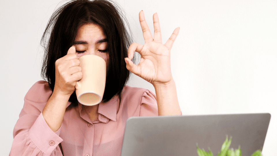 Tired person drinks coffee