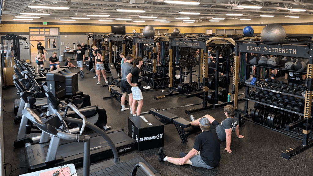 Andover High School student athletes work out in the weight room.