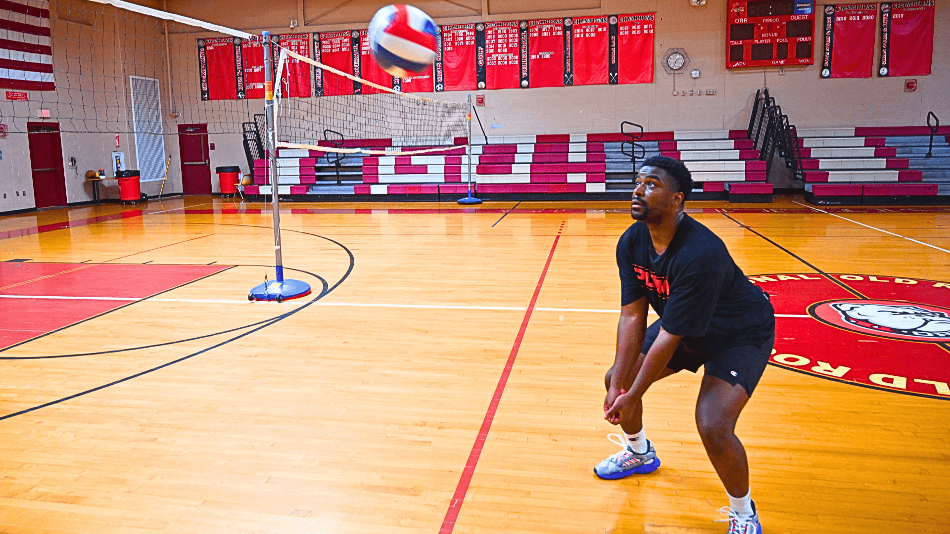 Person demonstrating the bump for volleyball lesson plans.