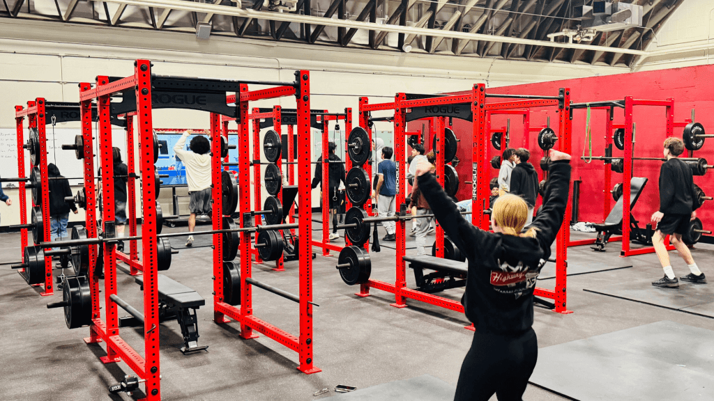 Students following along to a workout class at North High School.