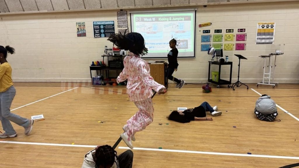 Students playing the PLT4M Jump To 100 activity.