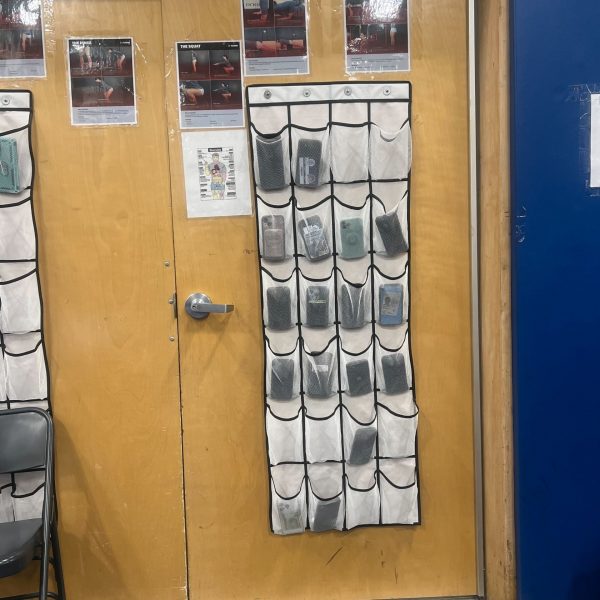 Shaker Phones stored in cubbies during physical education class.